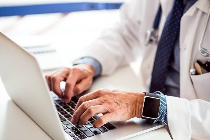 Electronic health records system on computer screen in clinic