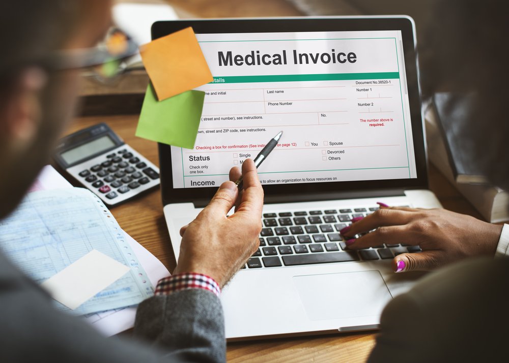 Medical billing software interface showing claims and invoices